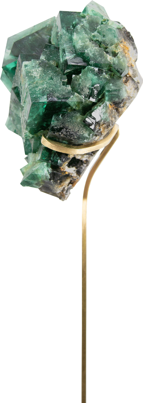 A wonderful green fluorite gemstone the size of a ball on a brass stand cradled fit